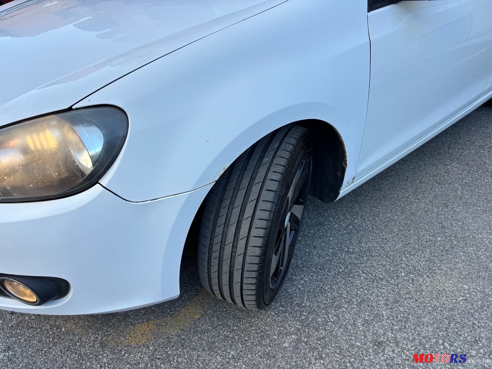 2012' Volkswagen Golf VI 1,6 Tdi photo #2