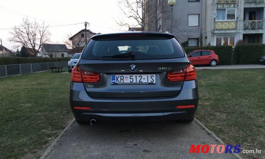 2012' BMW 3 Series Touring photo #5