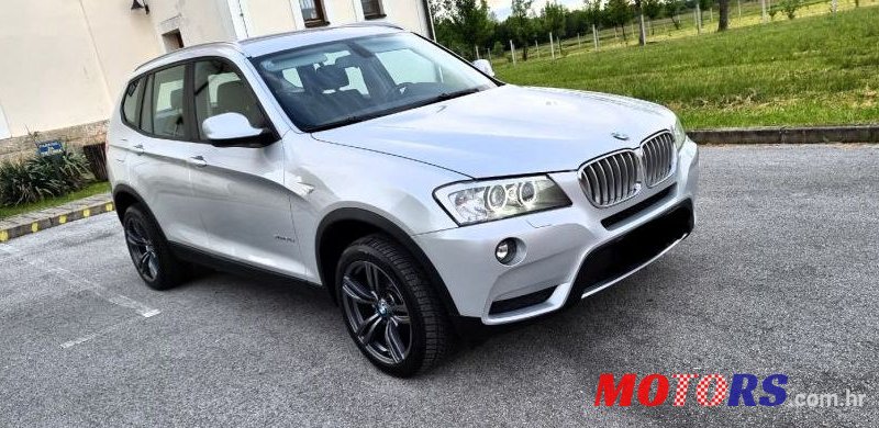 2011' BMW X3 Xdrive20D photo #1