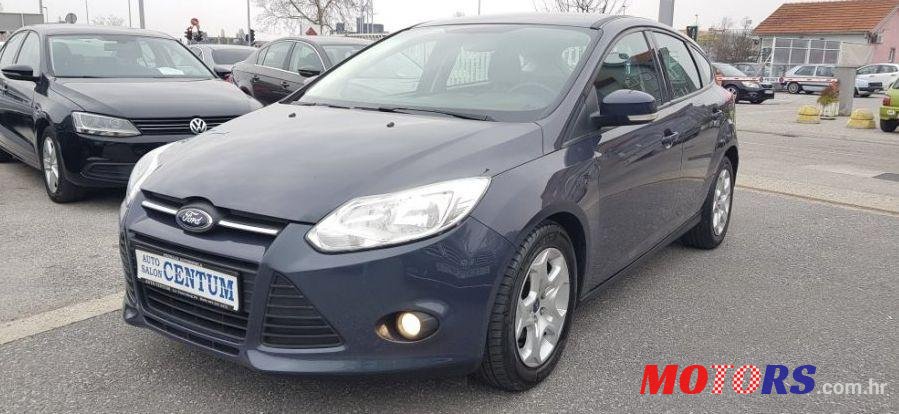 2011' Ford Focus 1,6 photo #1