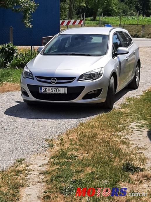 2015' Opel Astra Karavan photo #3