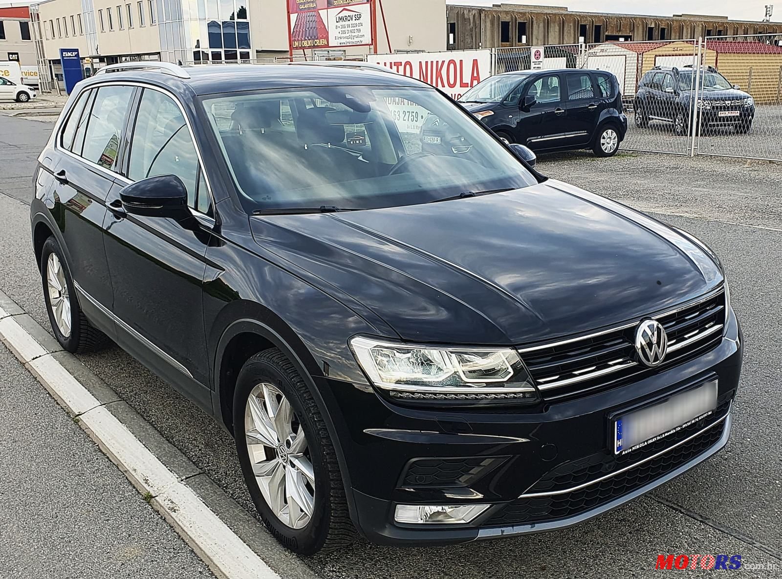 2016' Volkswagen Tiguan 2,0 Tdi Bmt photo #2