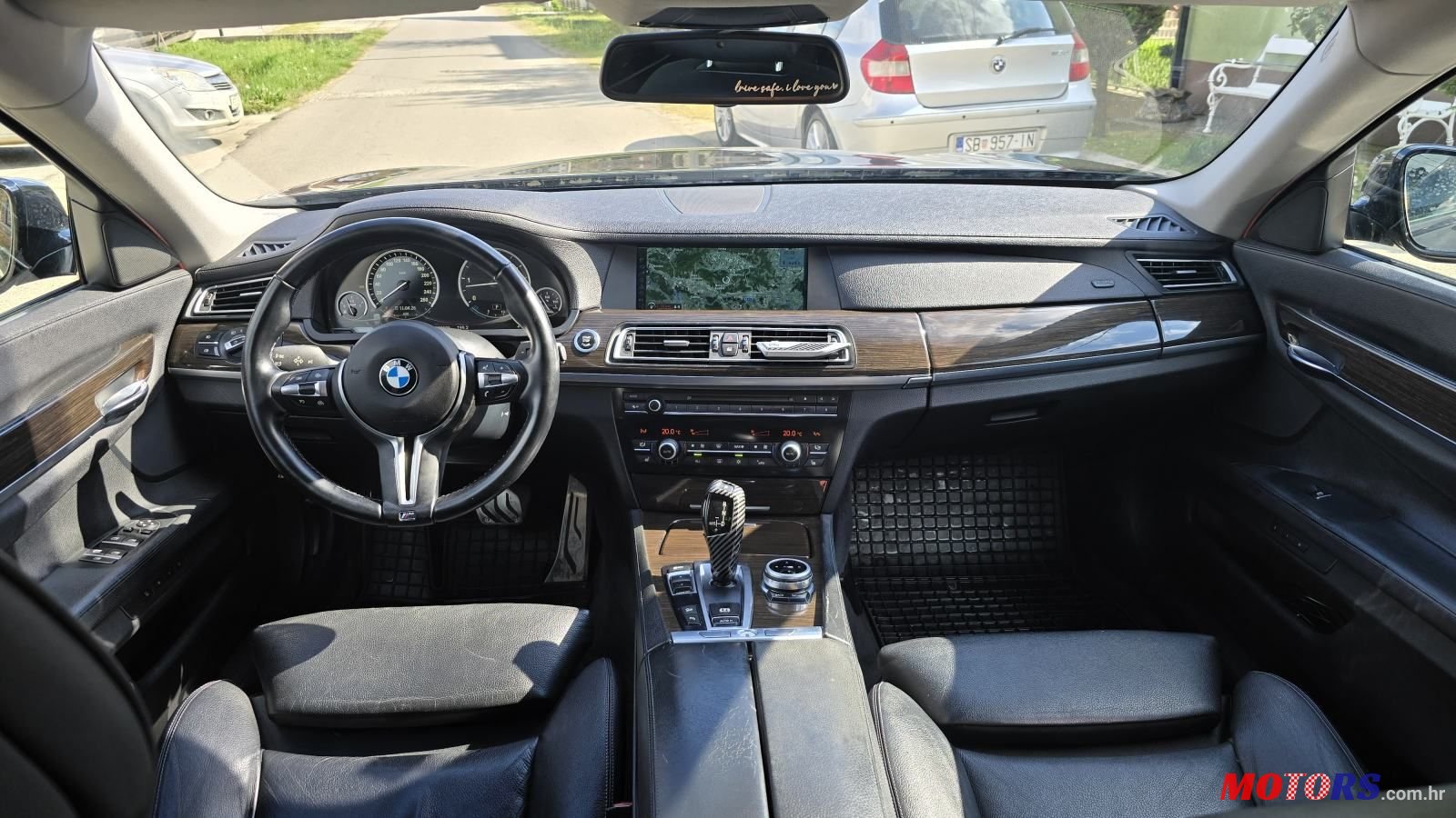 2011' BMW Serija 7 740D photo #6
