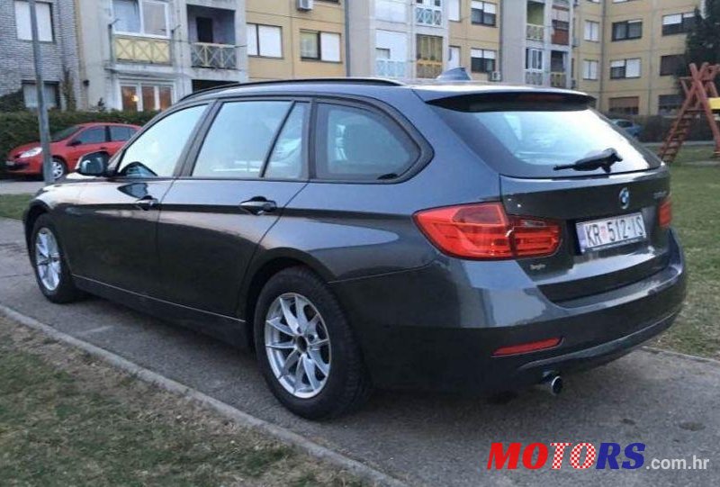 2012' BMW 3 Series Touring photo #4