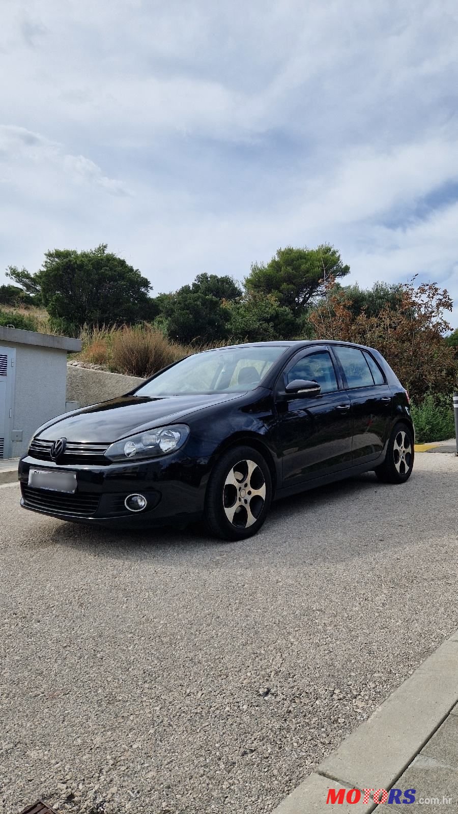 2009' Volkswagen Golf VI 1,4 photo #1