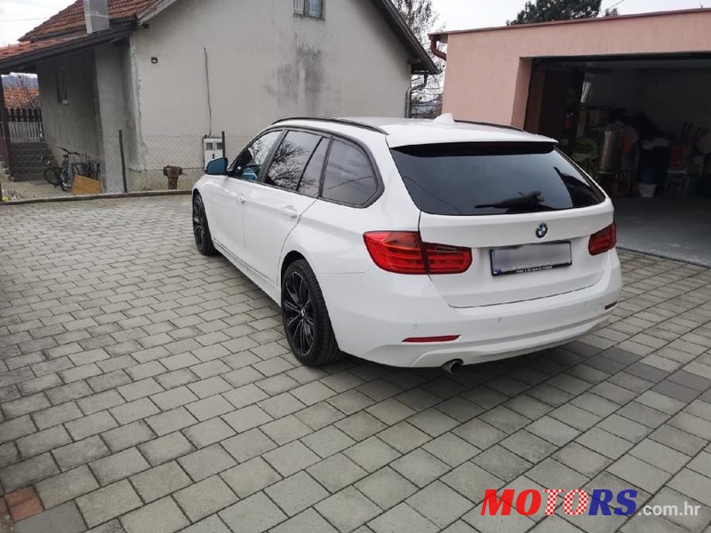 2014' BMW Serija 3 318D photo #6