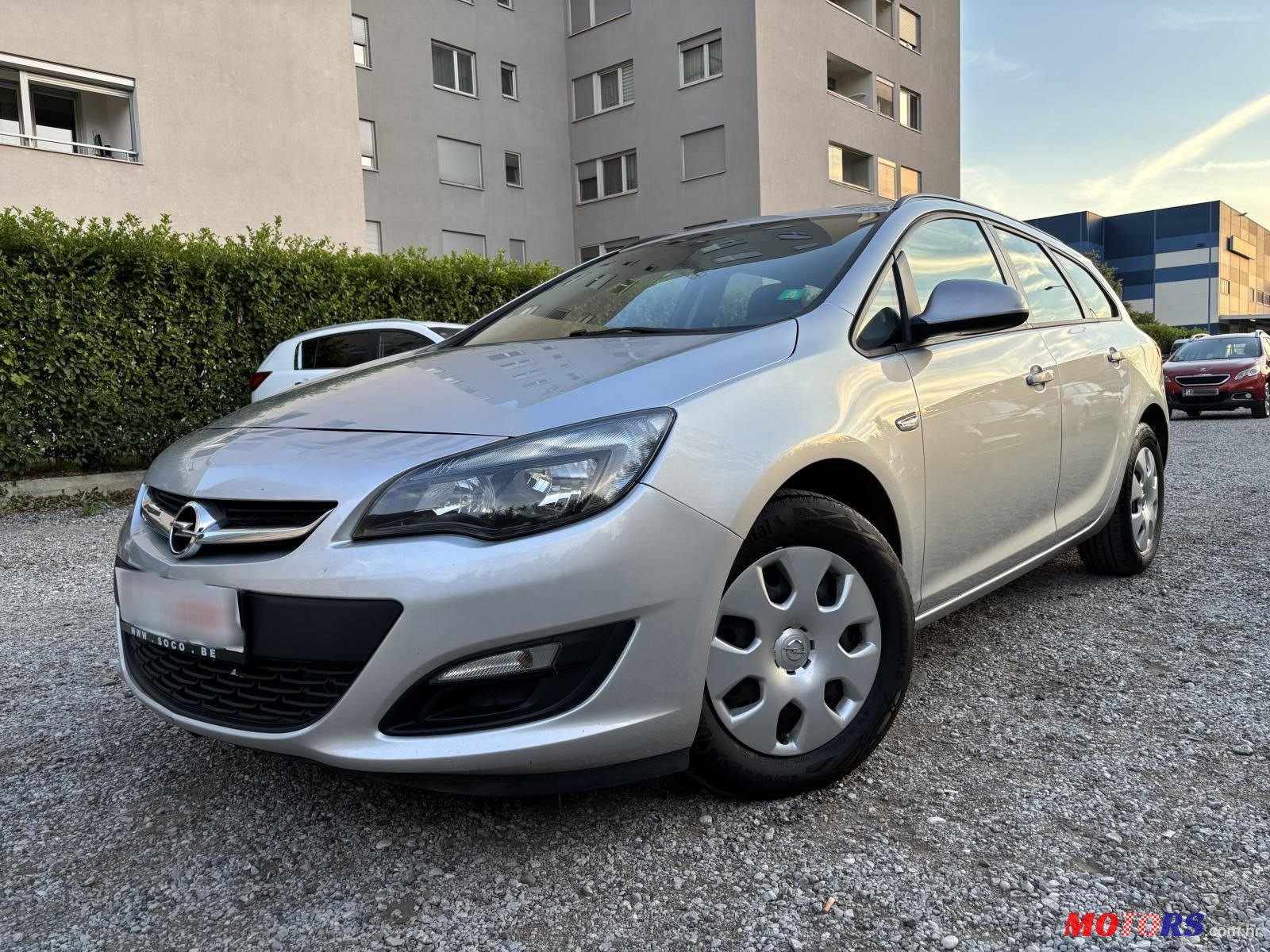 2014' Opel Astra Karavan photo #1