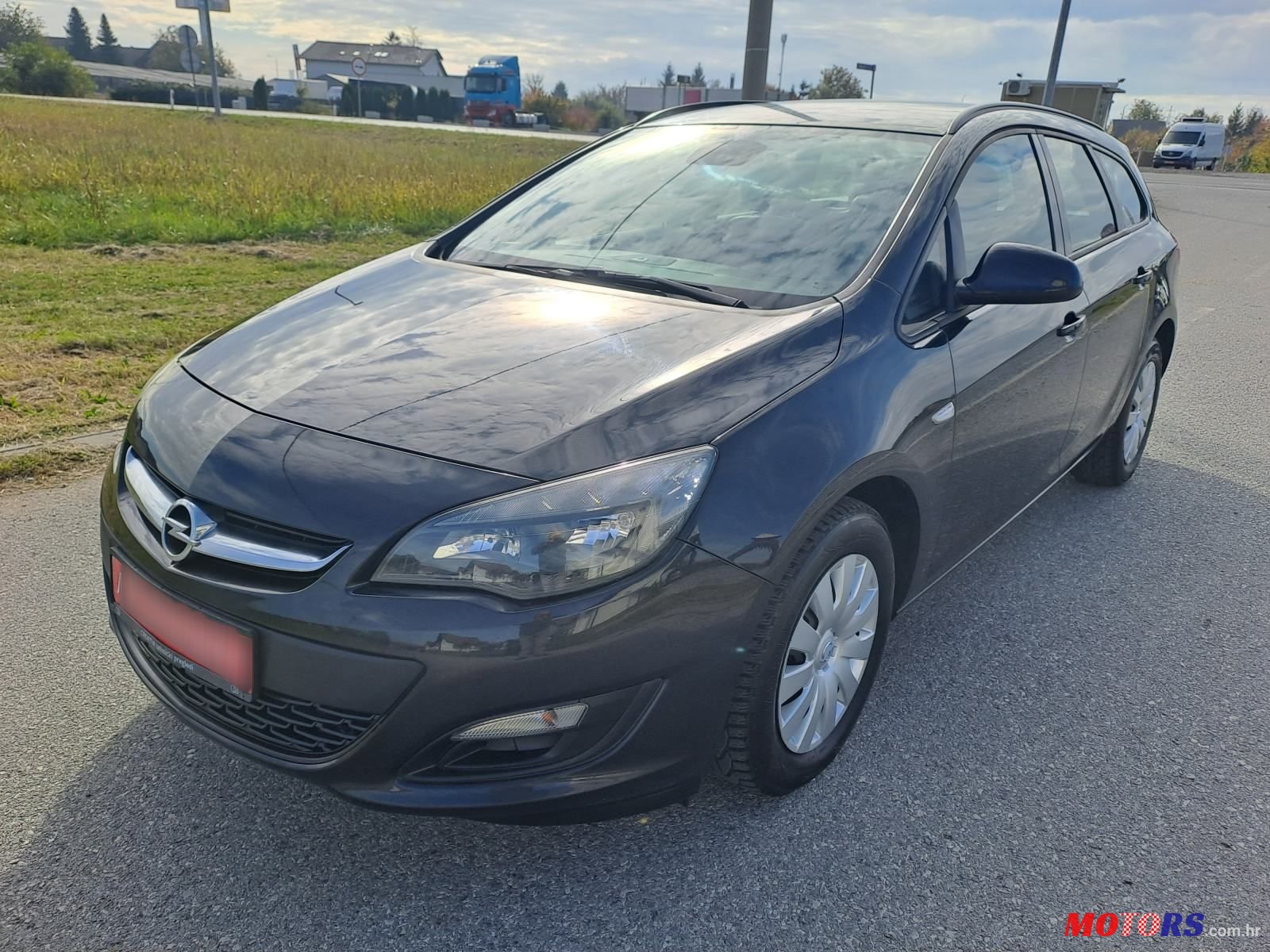 2015' Opel Astra Karavan photo #1