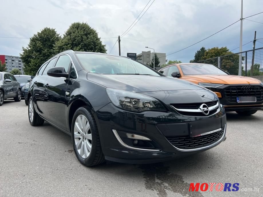 2015' Opel Astra Karavan photo #2