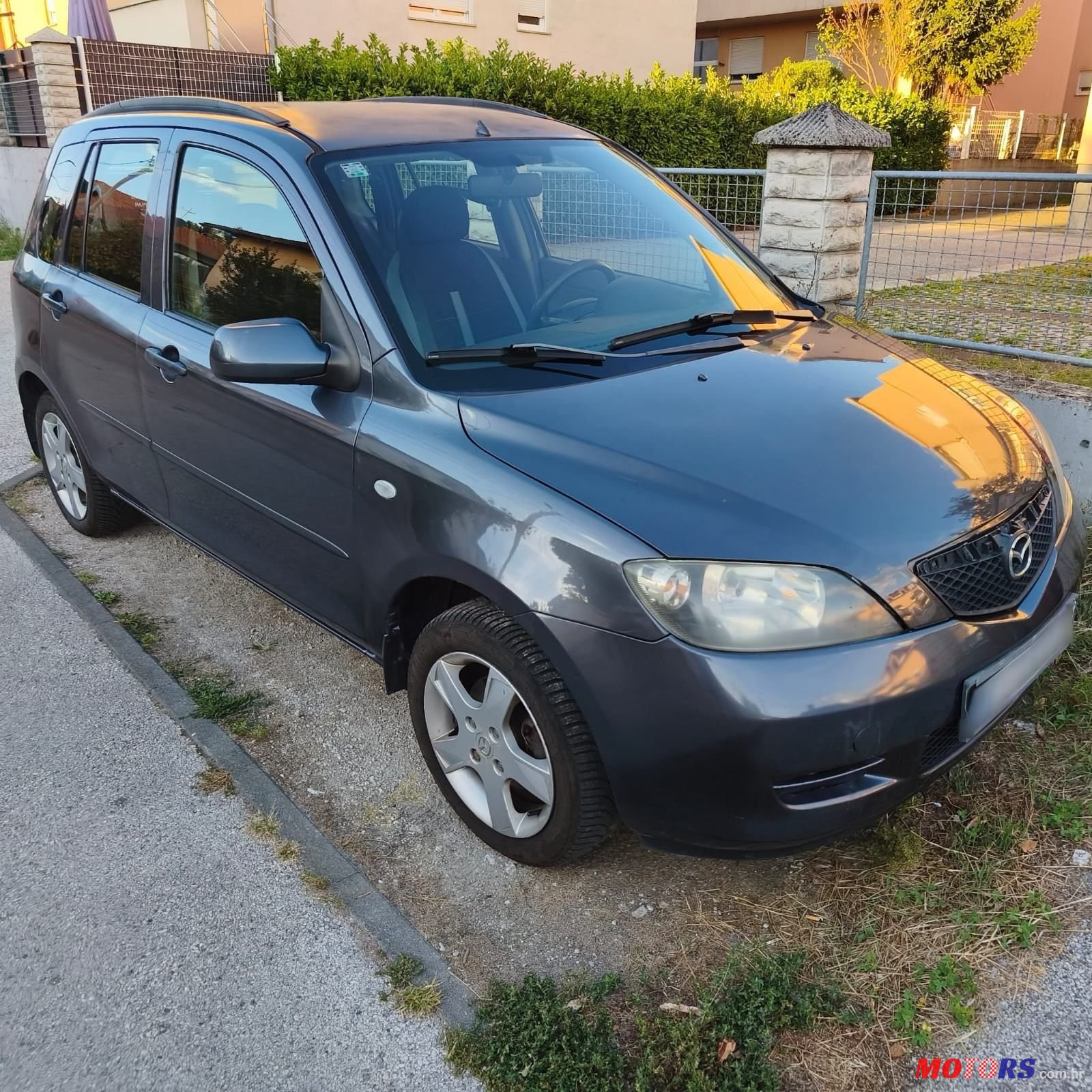 2004' Mazda 2 1,25 I photo #2