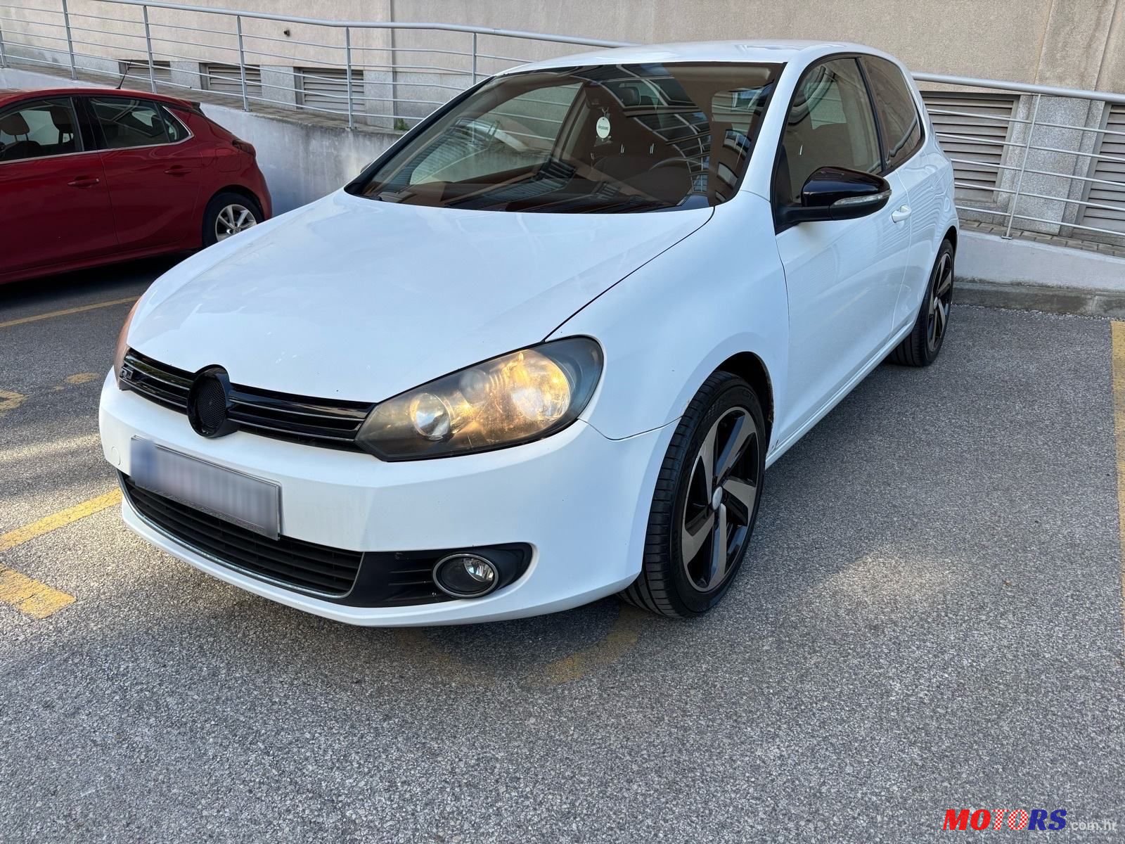 2012' Volkswagen Golf VI 1,6 Tdi photo #4