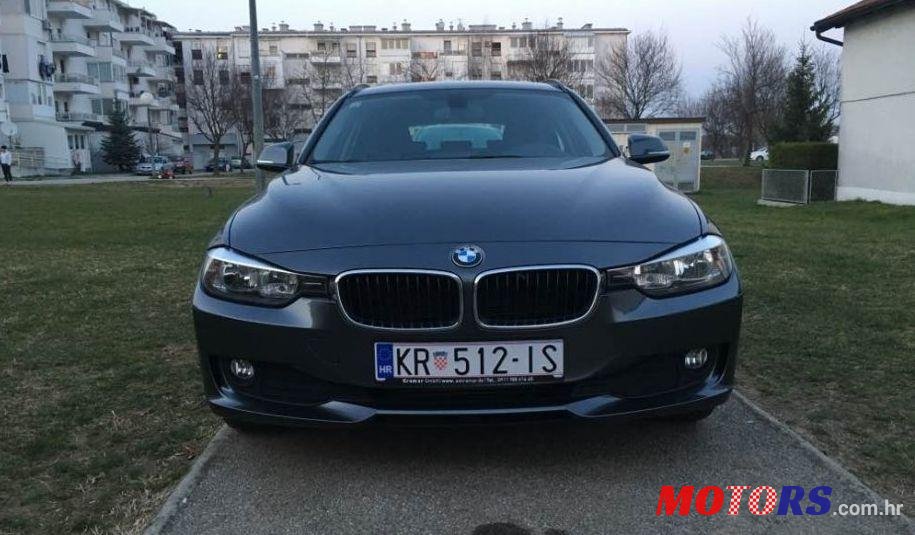 2012' BMW 3 Series Touring photo #3