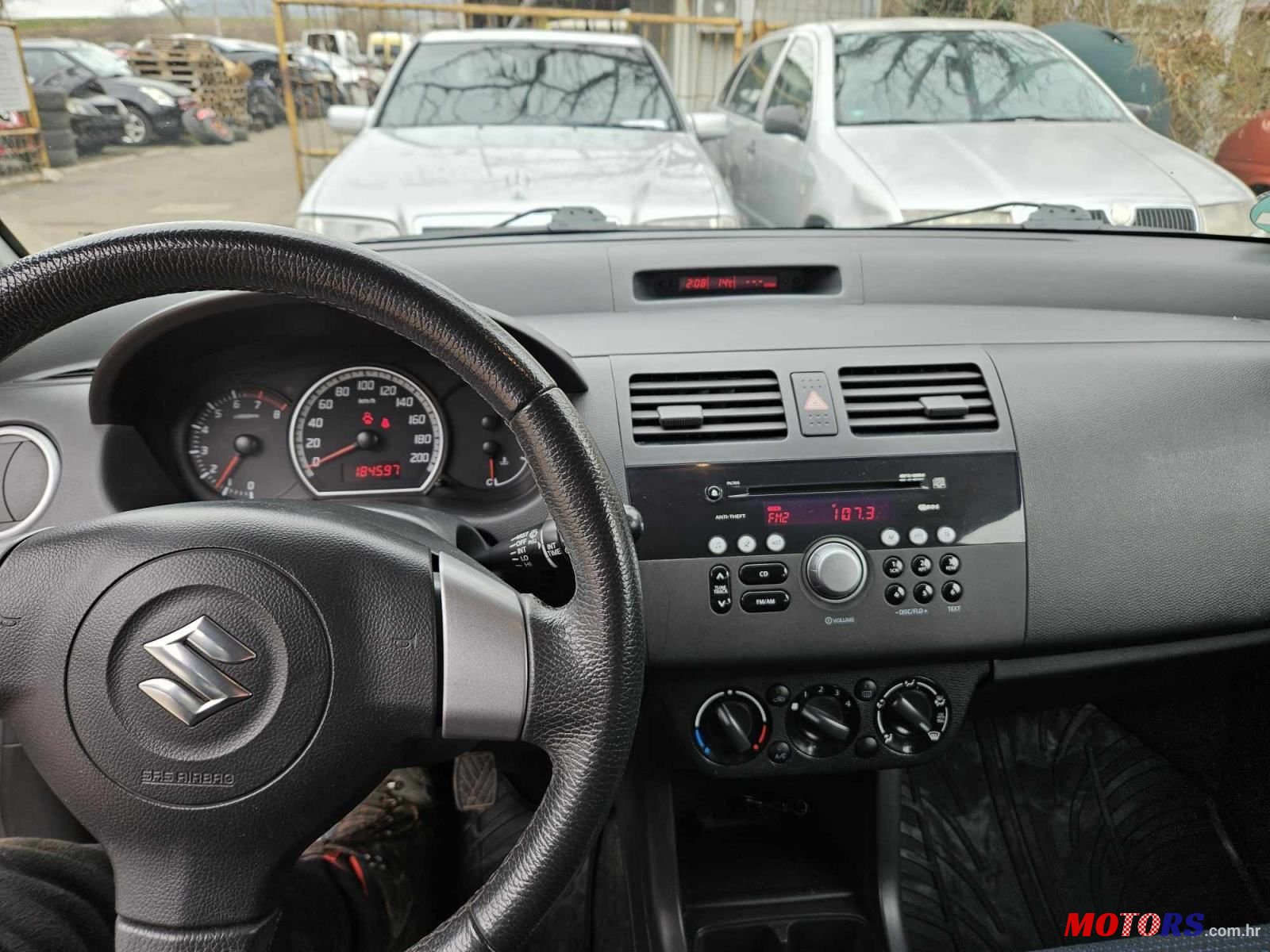 2009' Suzuki Swift 1,3 Gc photo #5