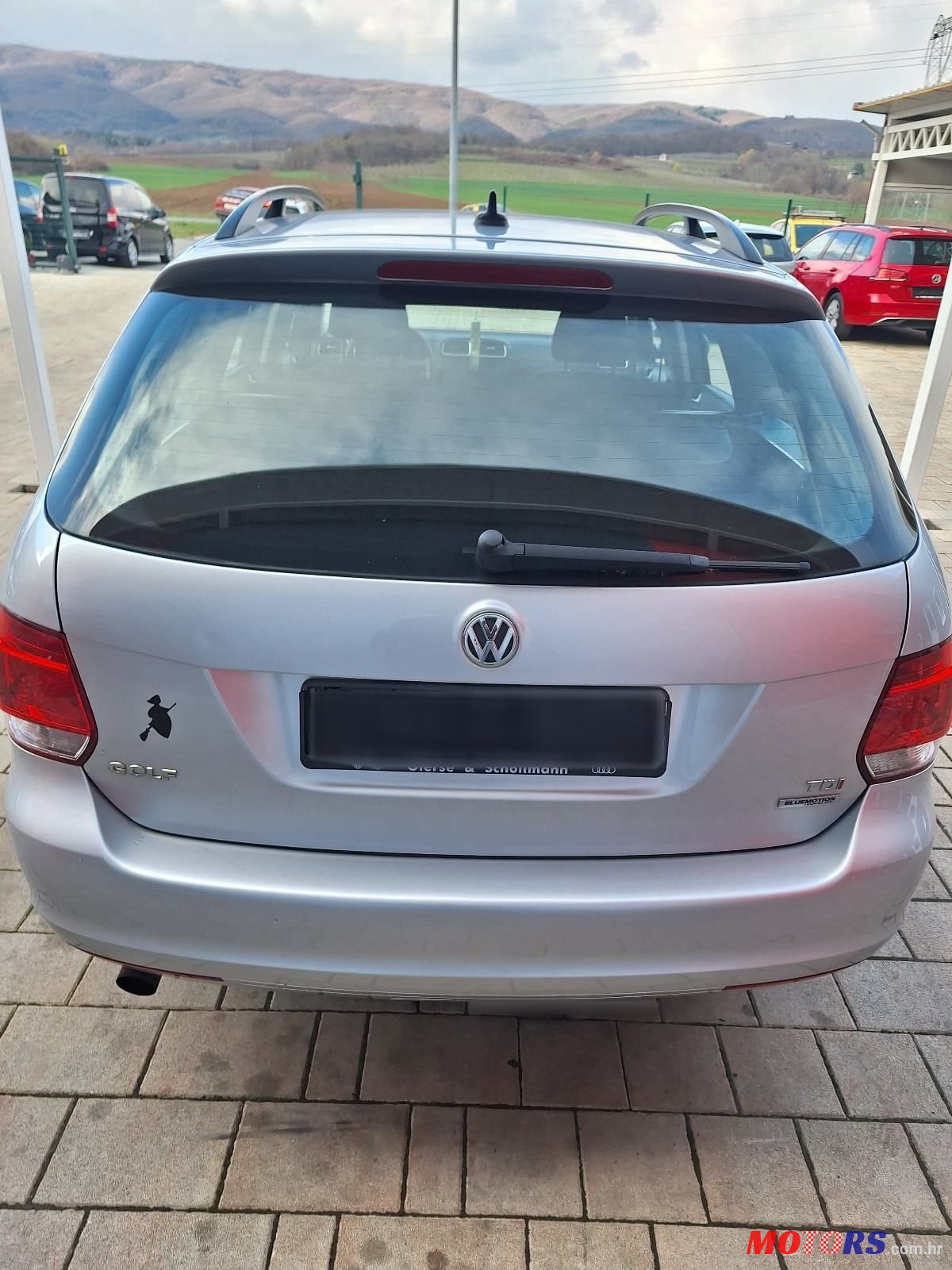 2011' Volkswagen Golf VI Variant photo #4