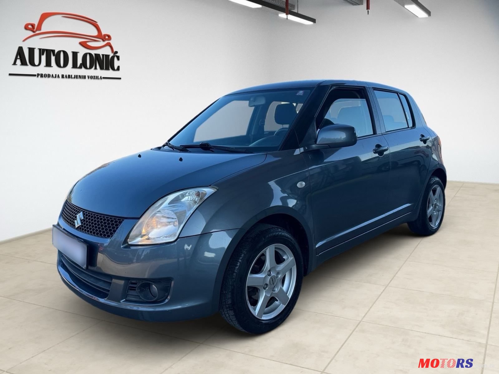 2009' Suzuki Swift 1,3 Gs photo #1