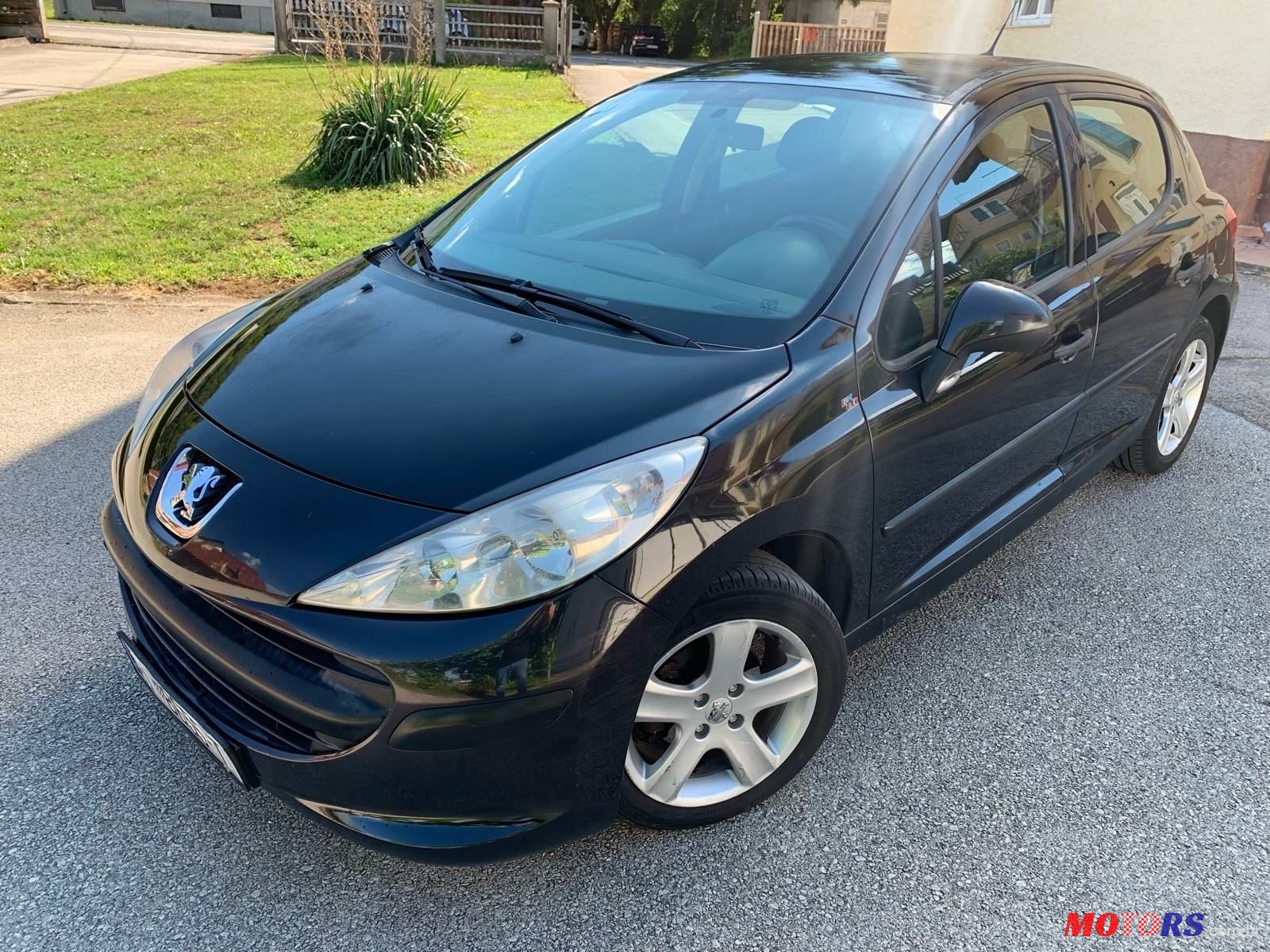 2007' Peugeot 207 1,4 photo #1