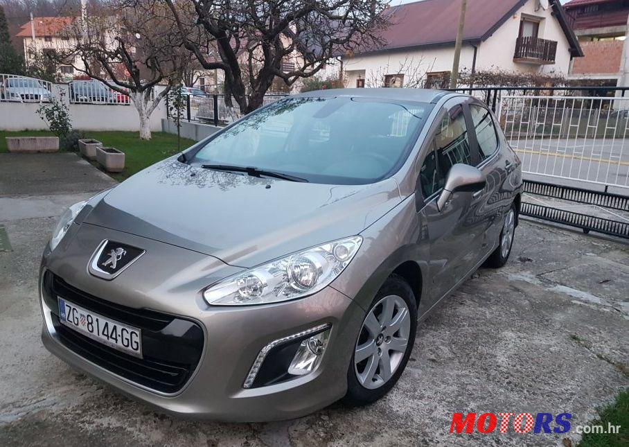 2013' Peugeot 308 1,6 E-Hdi photo #1