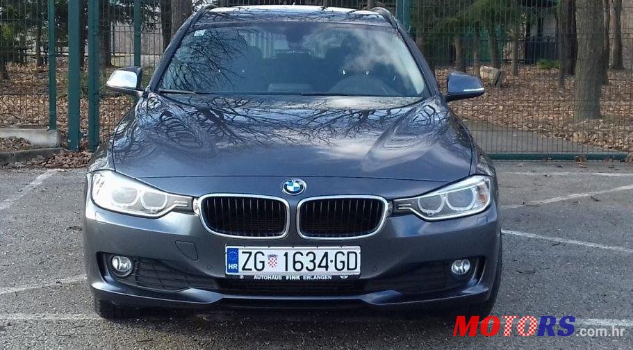 2012' BMW 3 Series 318D photo #1