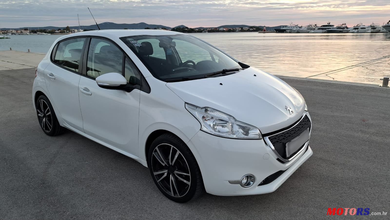 2013' Peugeot 208 1,4 Hdi photo #1