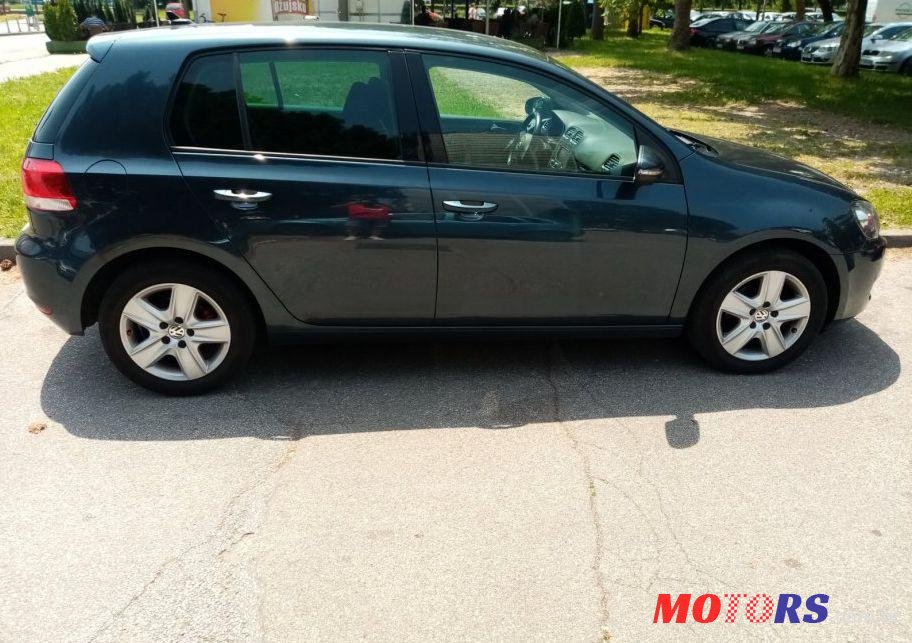 2010' Volkswagen Golf VI 1,6 Tdi photo #1