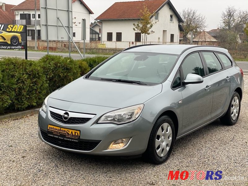 2011' Opel Astra Karavan photo #1