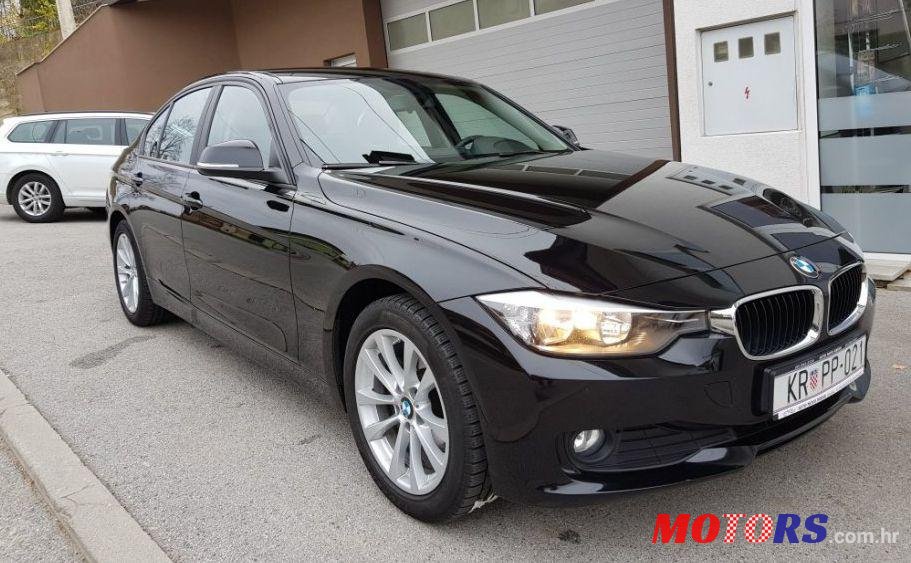 2014' BMW Serija 3 318D photo #2