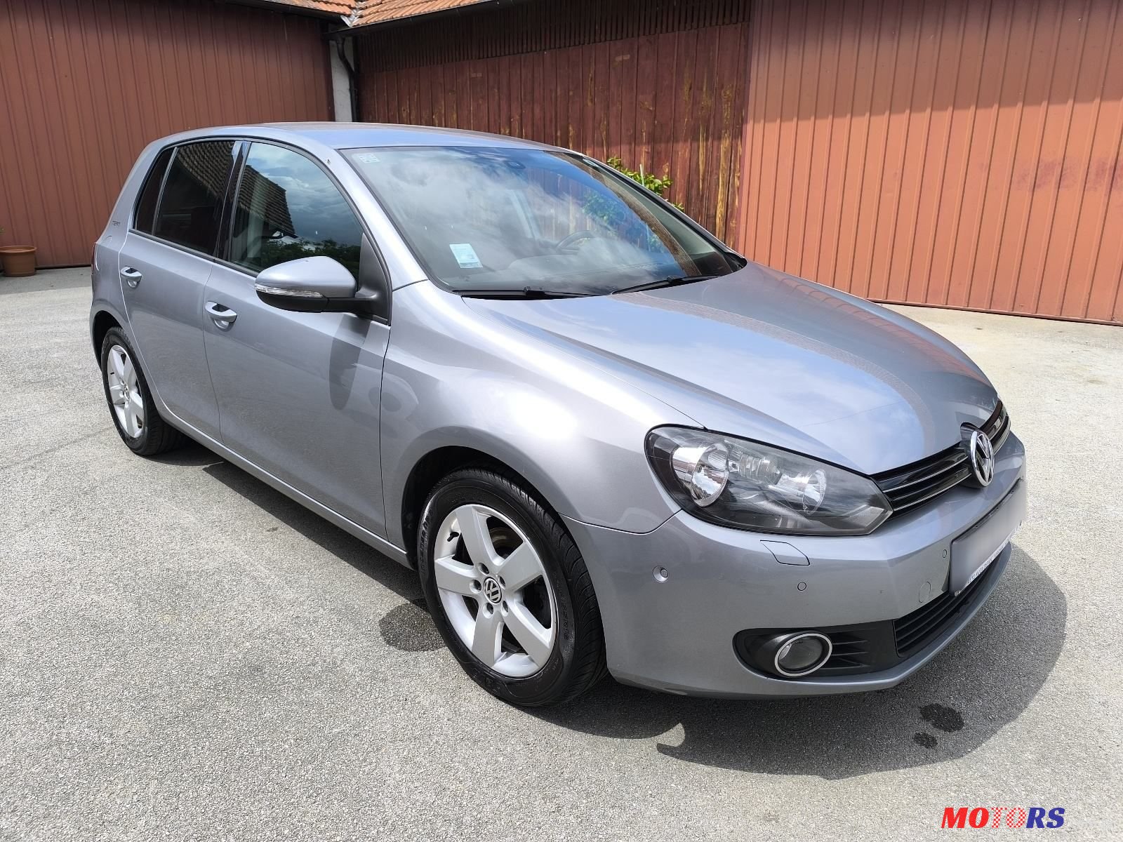 2010' Volkswagen Golf VI 1,6 Tdi photo #1