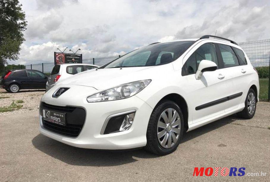 2012' Peugeot 308 Sw photo #2