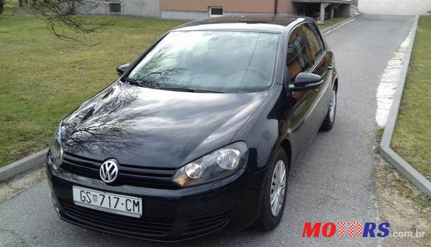 2010' Volkswagen Golf VI 1,6 Tdi photo #1
