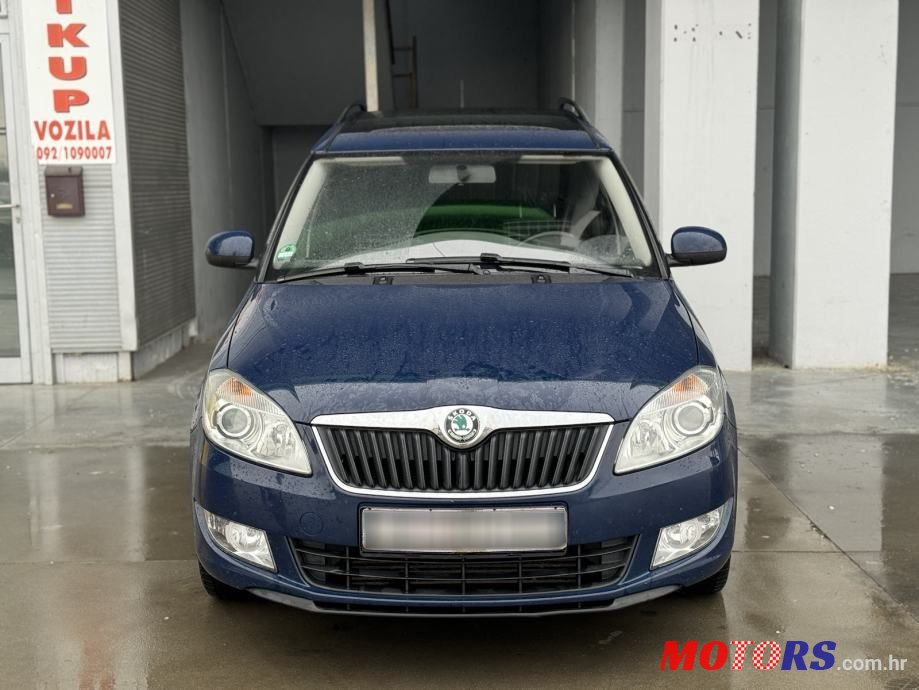 2013' Skoda Roomster 1,6 Tdi photo #2