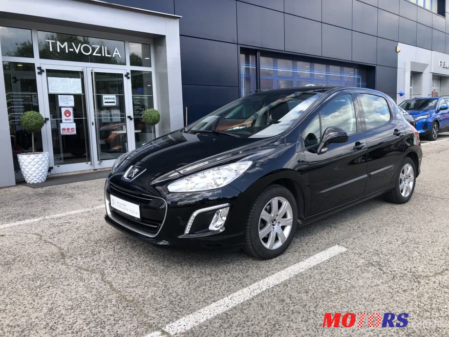 2013' Peugeot 308 photo #1