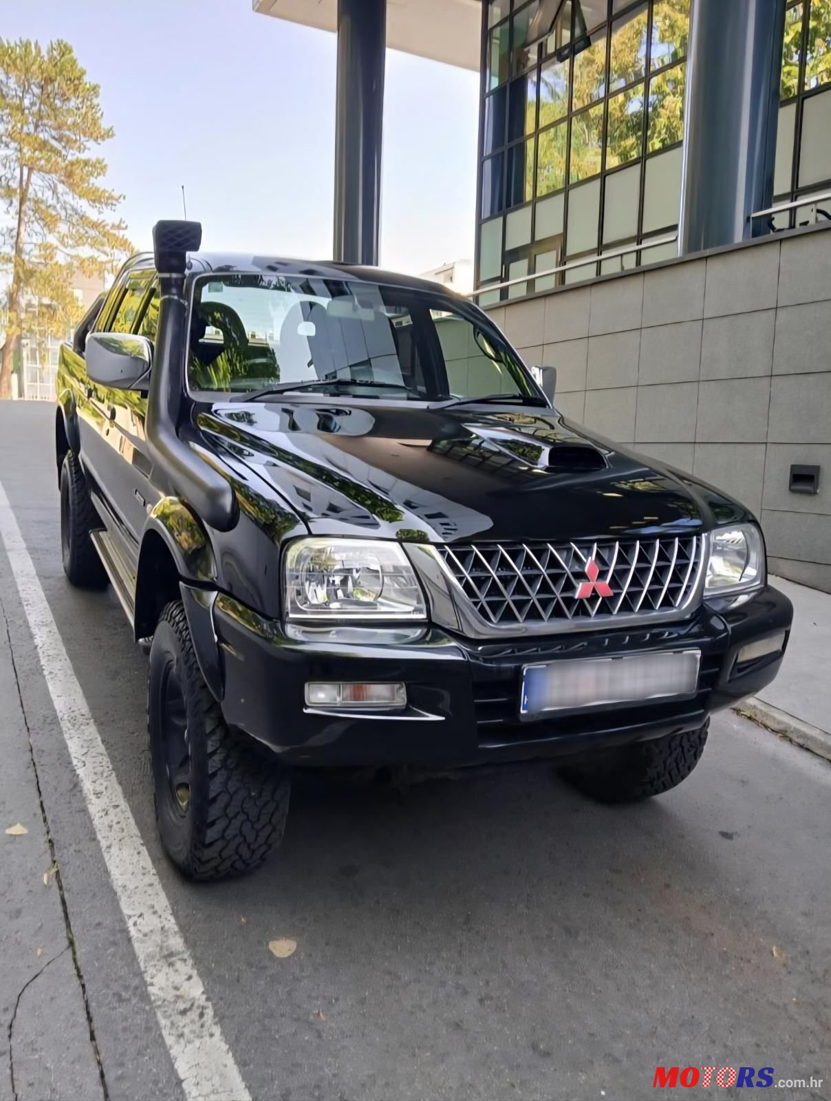 2003' Mitsubishi L200 Warrior photo #1