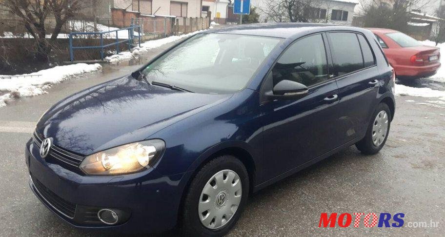 2012' Volkswagen Golf VI 1,6 Tdi photo #1