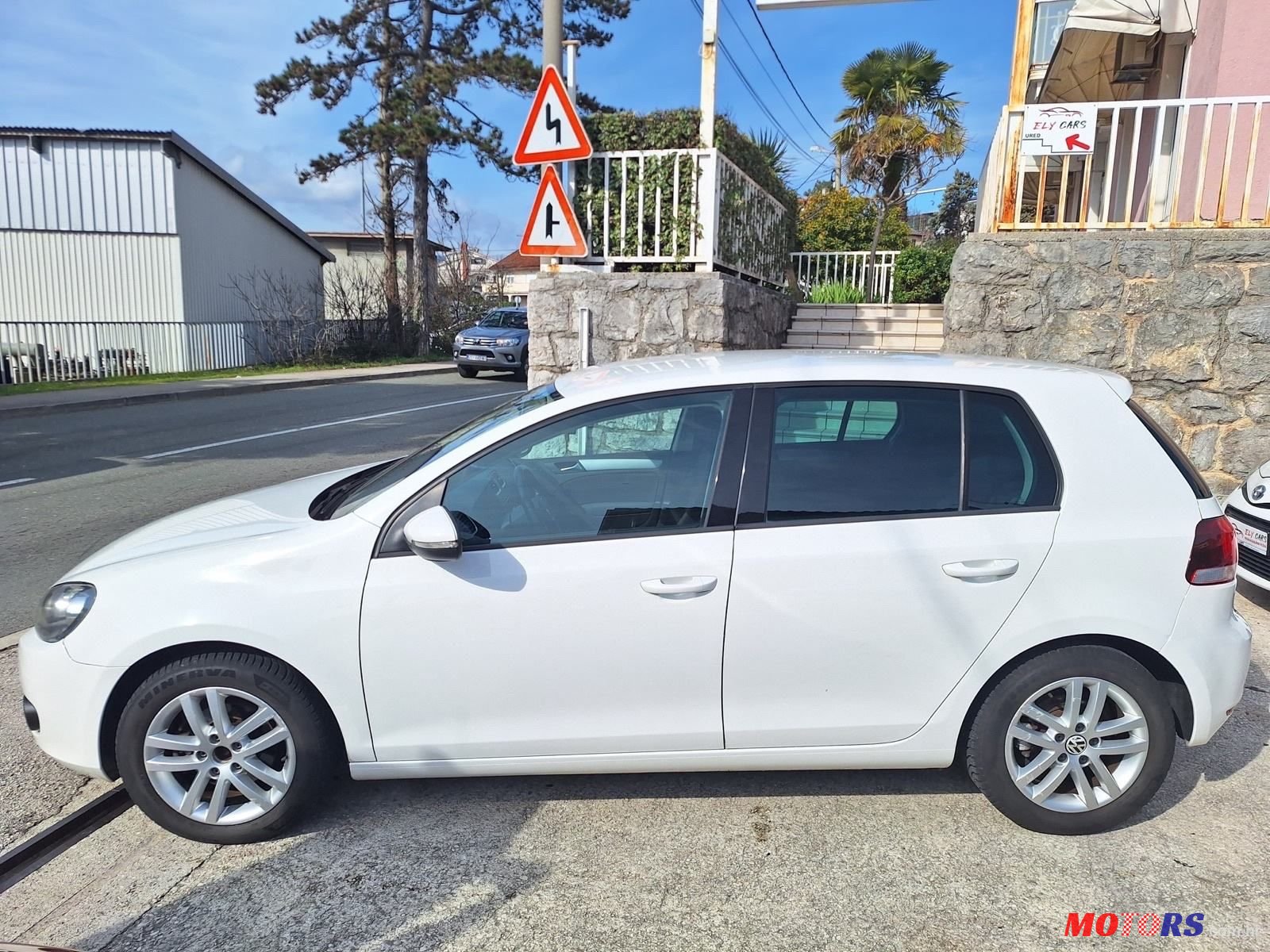 2011' Volkswagen Golf VI 1,6 Tdi photo #6