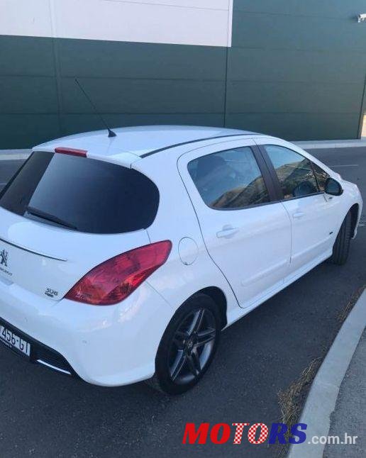 2012' Peugeot 308 photo #1