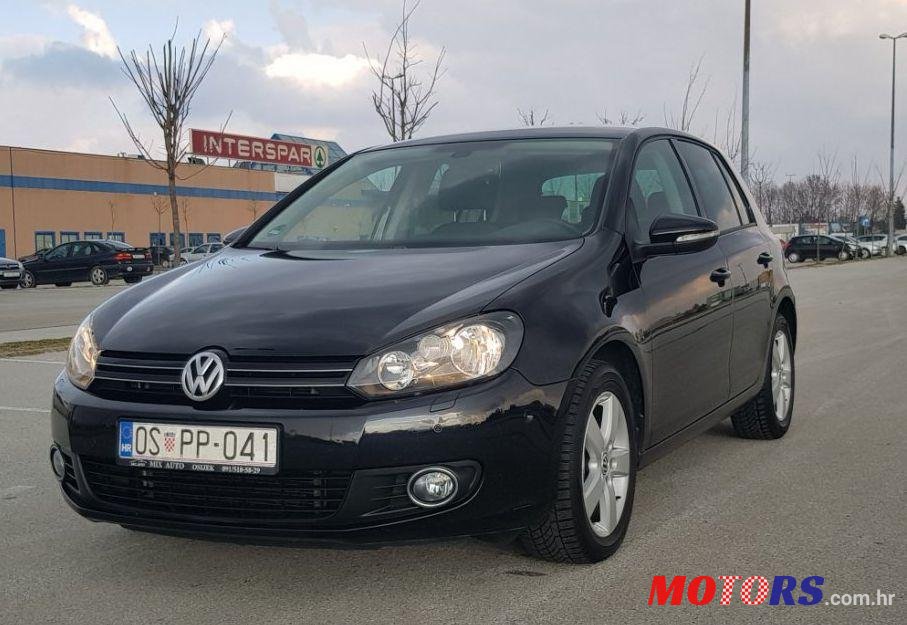2010' Volkswagen Golf VI 1,6 Tdi photo #2
