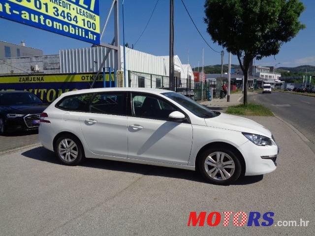 2014' Peugeot 308 Sw photo #3