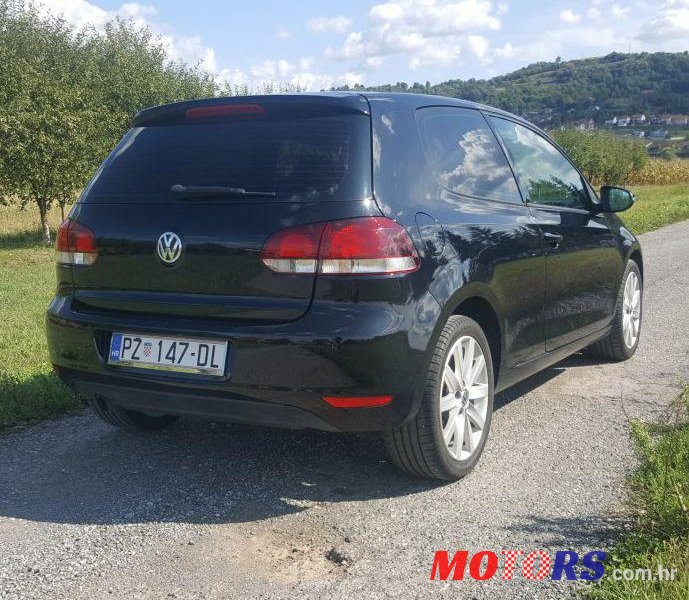 2009' Volkswagen Golf VI 1,6 Tdi photo #1