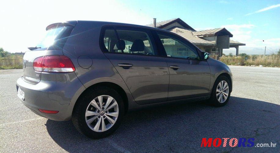 2011' Volkswagen Golf VI 1,6 TDI photo #3