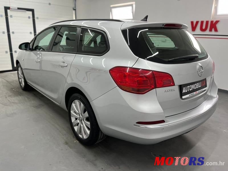 2015' Opel Astra Karavan photo #6