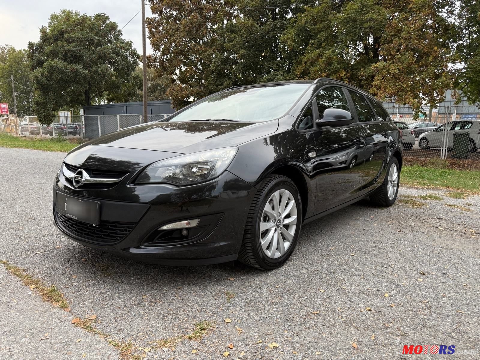 2013' Opel Astra Karavan photo #1