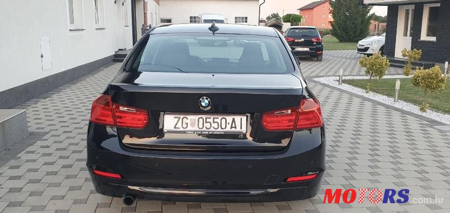 2014' BMW Serija 3 318D photo #2