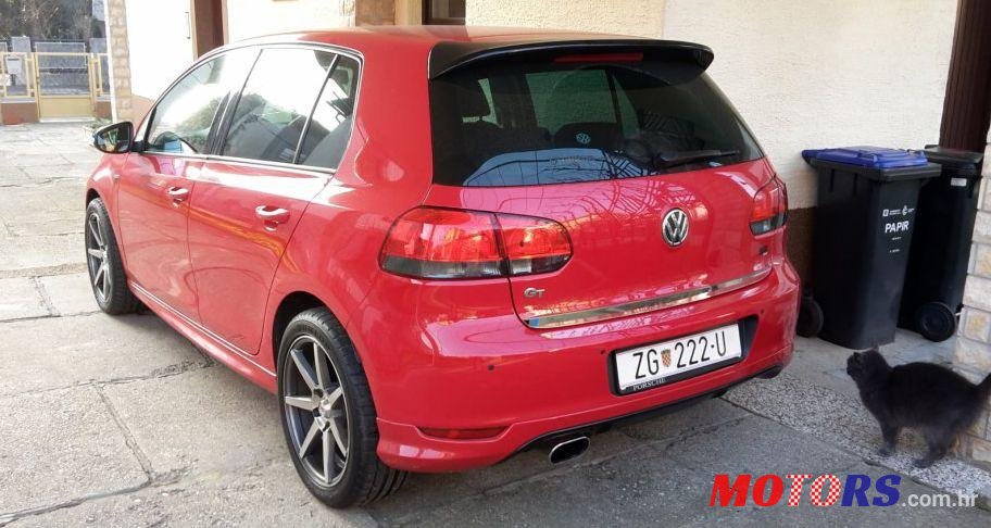 2012' Volkswagen Golf VI 1,6 Tdi photo #2