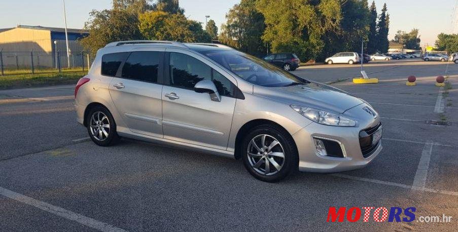 2013' Peugeot 308 Sw 1,6 E-Hdi photo #1