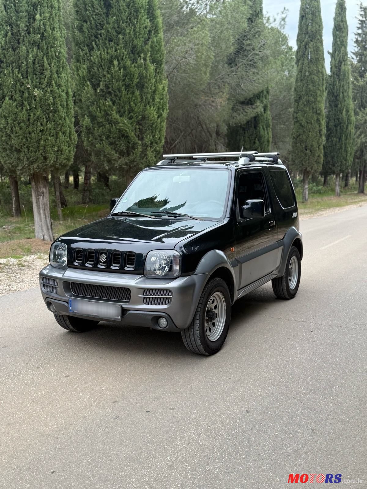 2006' Suzuki Jimny 1,3 Jlx photo #3