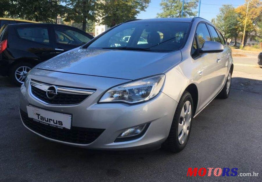 2012' Opel Astra Karavan photo #1