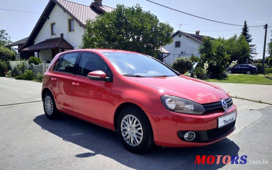 2009' Volkswagen Golf VI 1,6 photo #1
