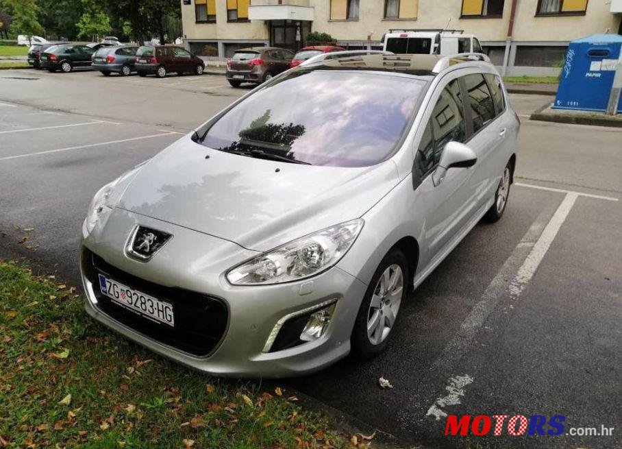 2012' Peugeot 308 Sw 1,6 E-Hdi photo #1