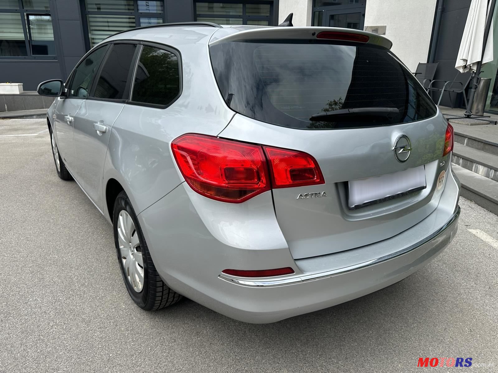 2014' Opel Astra Karavan photo #2