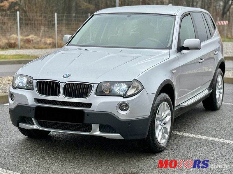 2009' BMW X3 Xdrive20D photo #1